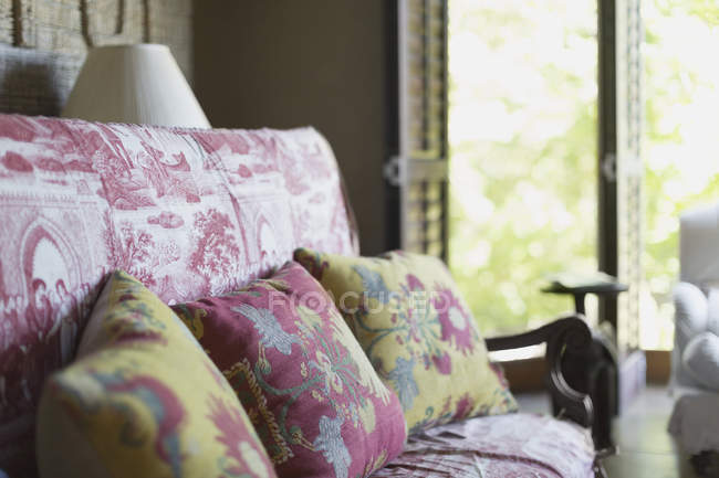 Pillows on sofa at luxury modern house — Stock Photo