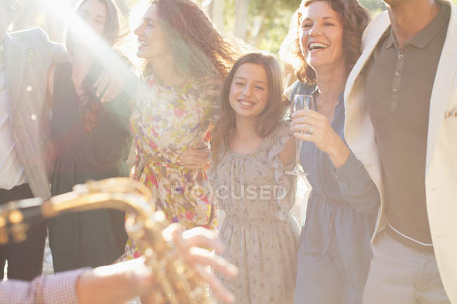 Happy modern family dancing together outdoors — Stock Photo