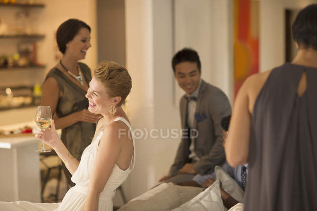 Friends relaxing at party — Stock Photo
