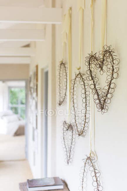 Wall hangings in rustic hallway — Stock Photo