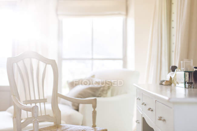 Armchair at vanity of rustic house — Stock Photo
