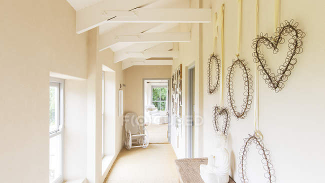 Decorative wall hangings in rustic house — Stock Photo
