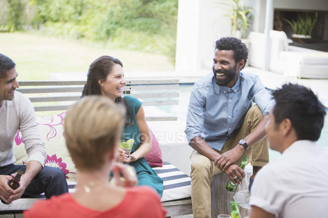 Friends laughing at party — Stock Photo