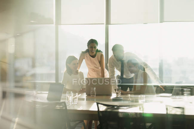 Business people working at laptop in conference room meeting — Stock Photo