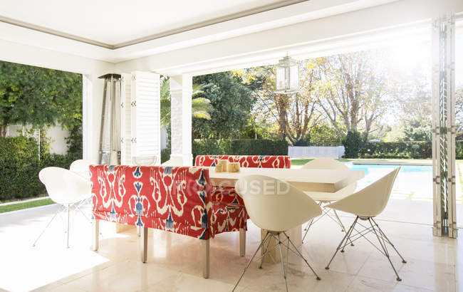 Home showcase dining room open to patio — Stock Photo