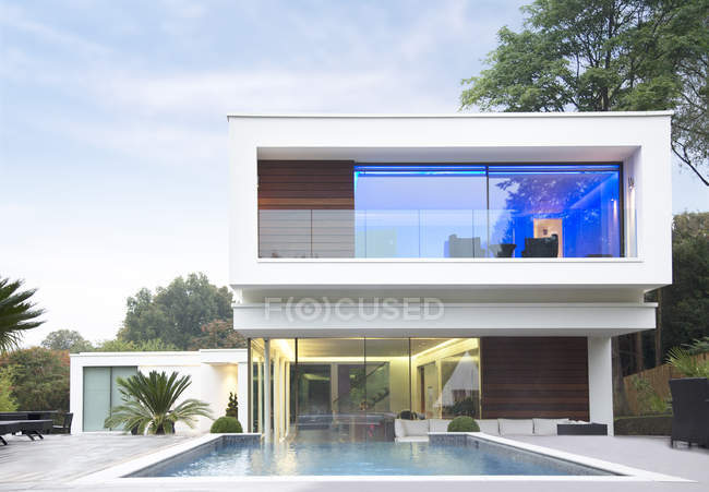Glowing room of modern house — Stock Photo