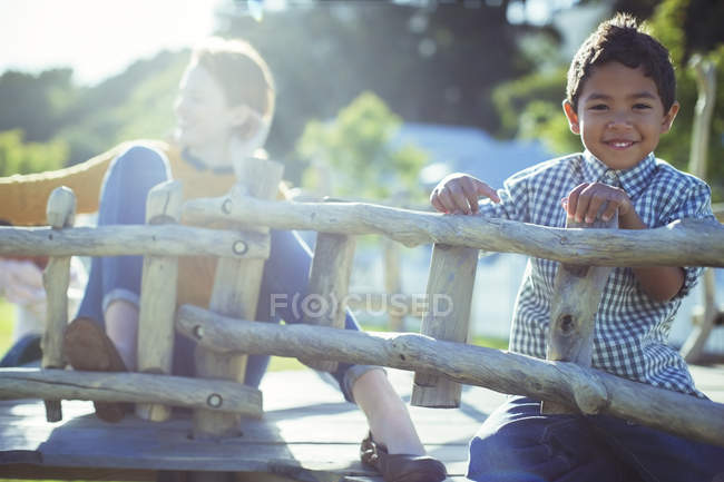 Teachers and students playing on play structure — Stock Photo