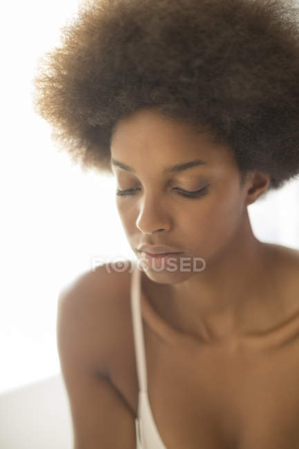 Close up portrait of serious woman in bra — Stock Photo