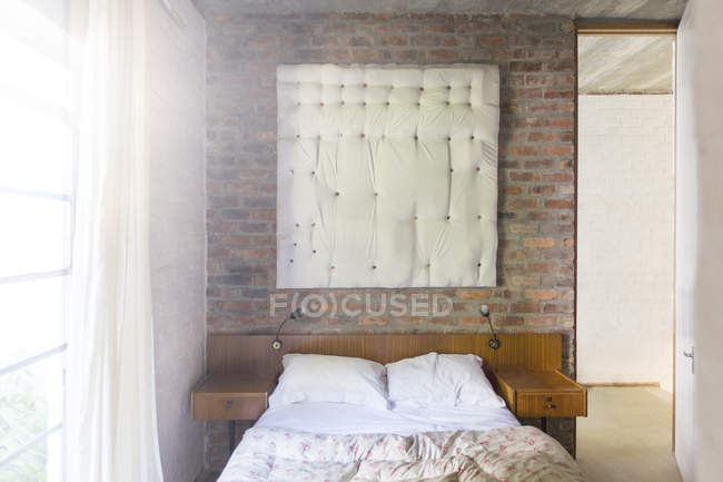 Wall hanging in modern bedroom — Stock Photo