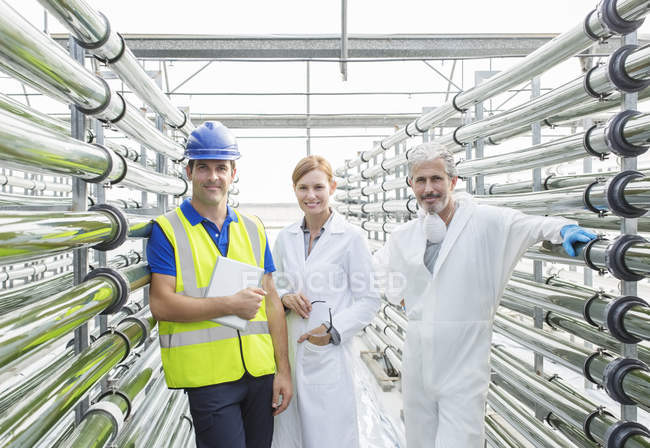 Portrait of scientists and engineer in greenhouse — Stock Photo