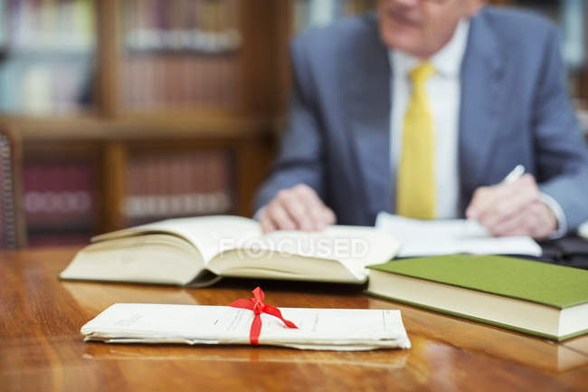 Lawyer researching in chambers — Stock Photo