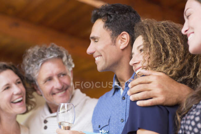 Happy modern family laughing together indoors — Stock Photo