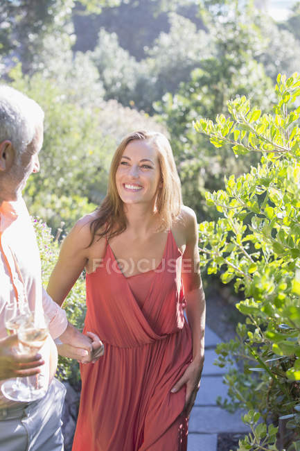 Couple having champagne together outdoors — Stock Photo