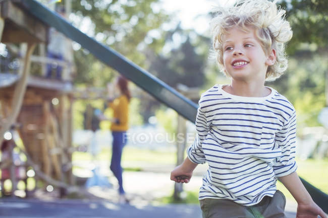 Boy playing on play ground — Stock Photo