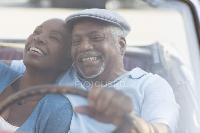 Couple driving in convertible together — Stock Photo