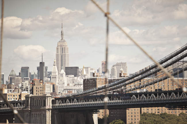 City cityscape and urban bridge — Stock Photo