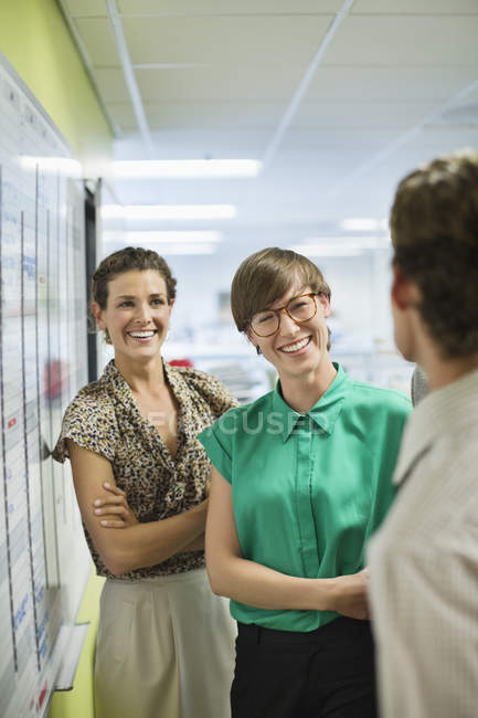 Business people talking at modern office — Stock Photo