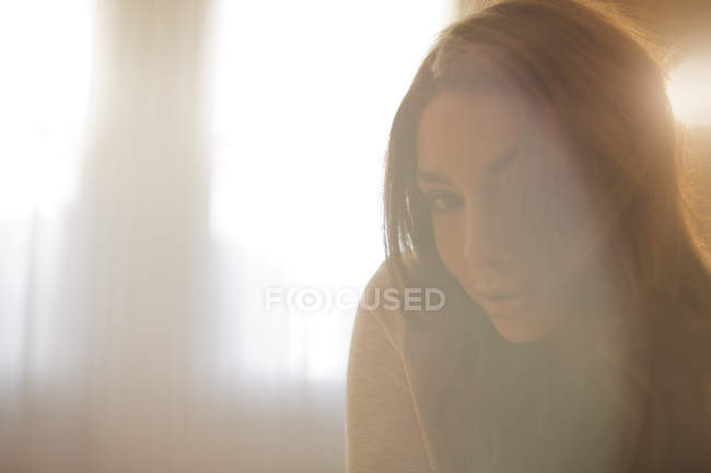 Blurred view of young attractive woman face — Stock Photo