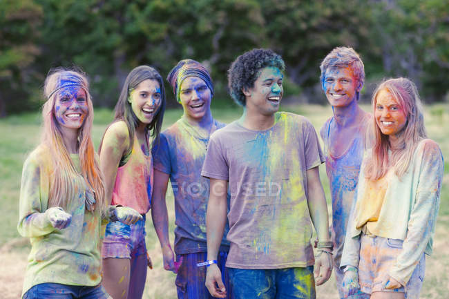 Portrait of friends covered in chalk dye — Stock Photo