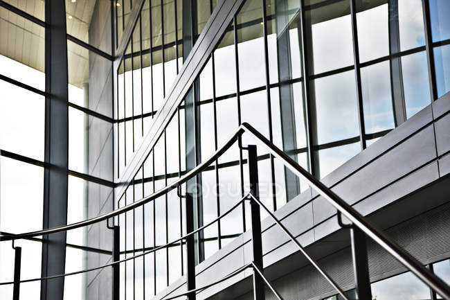 Railing and steps in modern building — Stock Photo