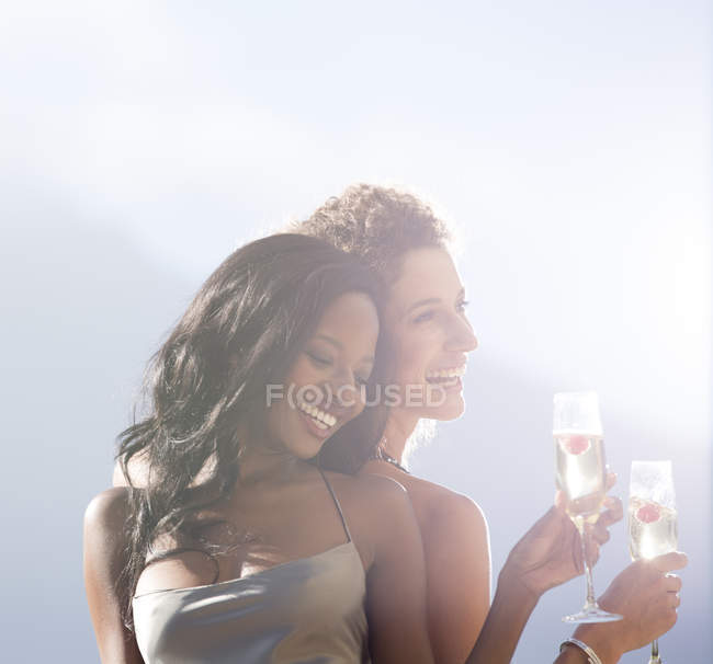 Young attractive Women smiling together outdoors — Stock Photo