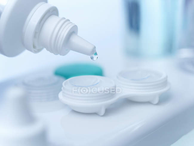 Close up of saline dropping on contact lens — Stock Photo