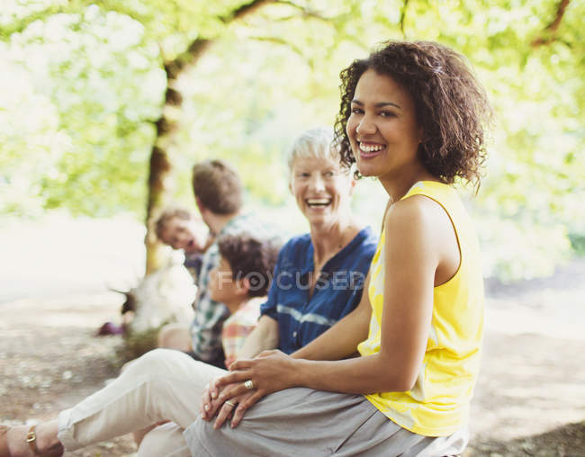 Portrait laughing multi-generation family in woods — Stock Photo