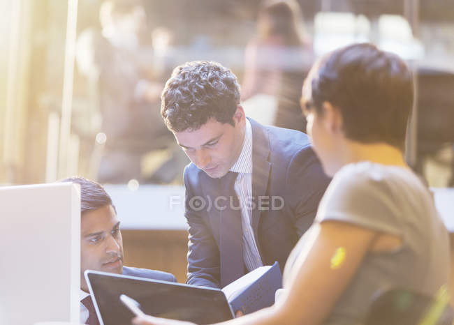 Business people working in meeting — Stock Photo