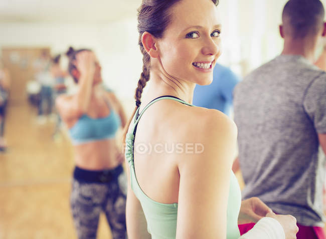 Portrait smiling woman in exercise class — Stock Photo