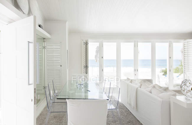 Modern dining table indoors during daytime — Stock Photo