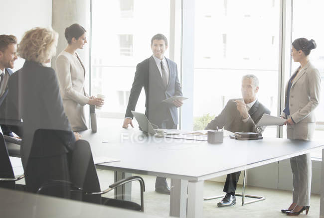 Business people talking in conference room — Stock Photo