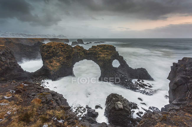 Rock formations among stormy ocean, Amarstapi, Snaefellsnes, Iceland — Stock Photo