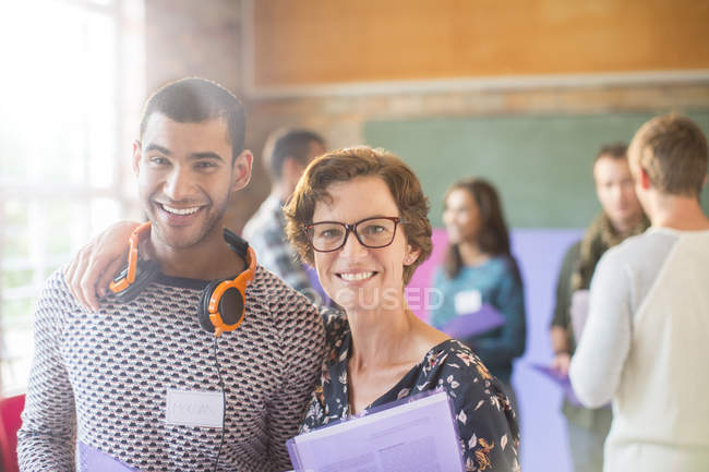 Portrait of smiling people at seminar — Stock Photo