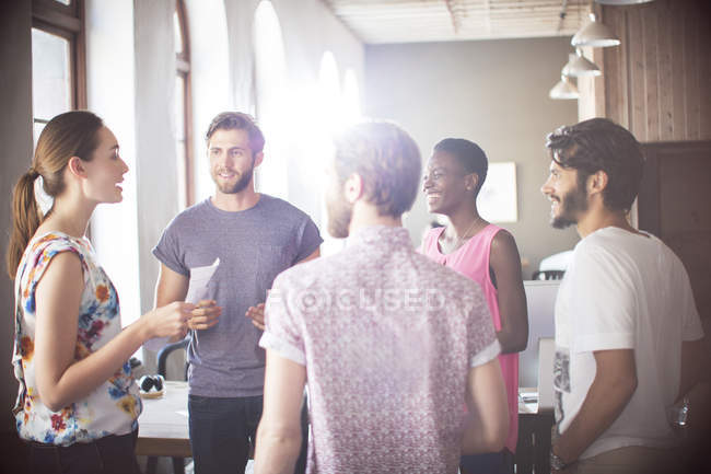Casual business people talking at modern office — Stock Photo