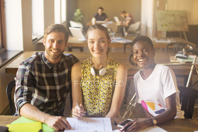 Portrait smiling creative business people working in office — Stock Photo