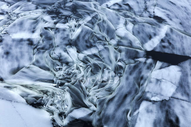 Ice swirling in ocean, full frame — Stock Photo