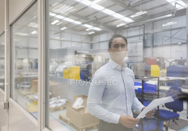 Portrait serious manager in steel factory — Stock Photo
