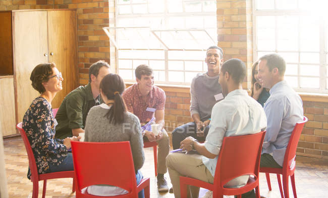 People in circle enjoying group therapy session — Stock Photo