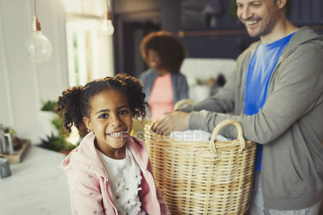 Portrait smiling daughter with father in kitchen — Stock Photo