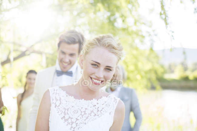 Portrait of young couple in domestic garden — Stock Photo