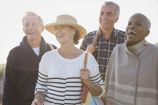 Enthusiastic senior couples during daytime — Stock Photo