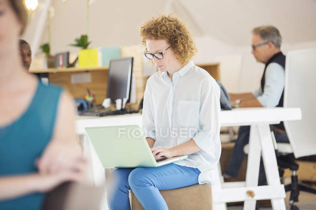 Woman and man sitting and working in office — Stock Photo