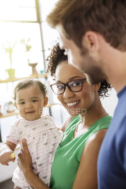 Portrait of parents with baby daughter — Stock Photo