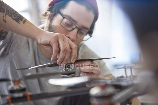 Male designer assembling drone, closeup — Stock Photo