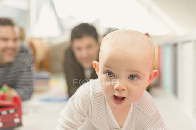 Close up curious baby boy, blurred background — Stock Photo