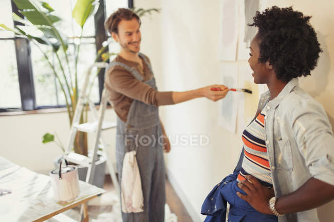 Couple painting living room — Stock Photo