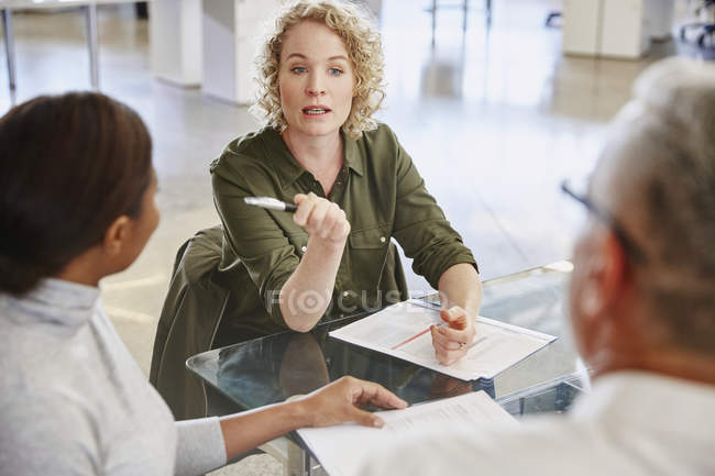 Businesswoman talking in meeting at modern office — Stock Photo