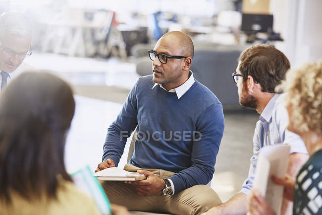 Business people talking in meeting at modern office — Stock Photo