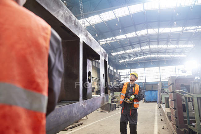 Caucasian male worker in steel factory — Stock Photo