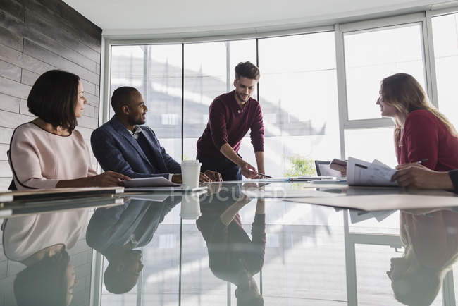 Businessman leading conference room meeting — Stock Photo
